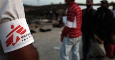 SIKAMINIAS, GREECE - OCTOBER 16:  Recently arrived migrants line up for buses provided by the medical charity Doctors Without Borders after arriving from Turkey onto the island of Lesbos on October 16, 2015 in Sikaminias, Greece. Dozens of rafts and boats are still making the journey daily as thousands flee conflict in Iraq, Syria, Afghanistan and other countries. More than 500,000 migrants have entered Europe so far this year. Of that number four-fifths of have paid to be smuggled by sea to Greece from Turkey, the main transit route into the EU. Nearly all of those entering Greece on a boat from Turkey are from the war zones of Syria, Iraq and Afghanistan.  (Photo by Spencer Platt/Getty Images)